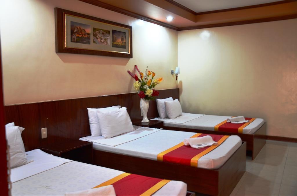 Ysabelle Mansion Bed and Breakfast Puerto Princesa Værelse billede